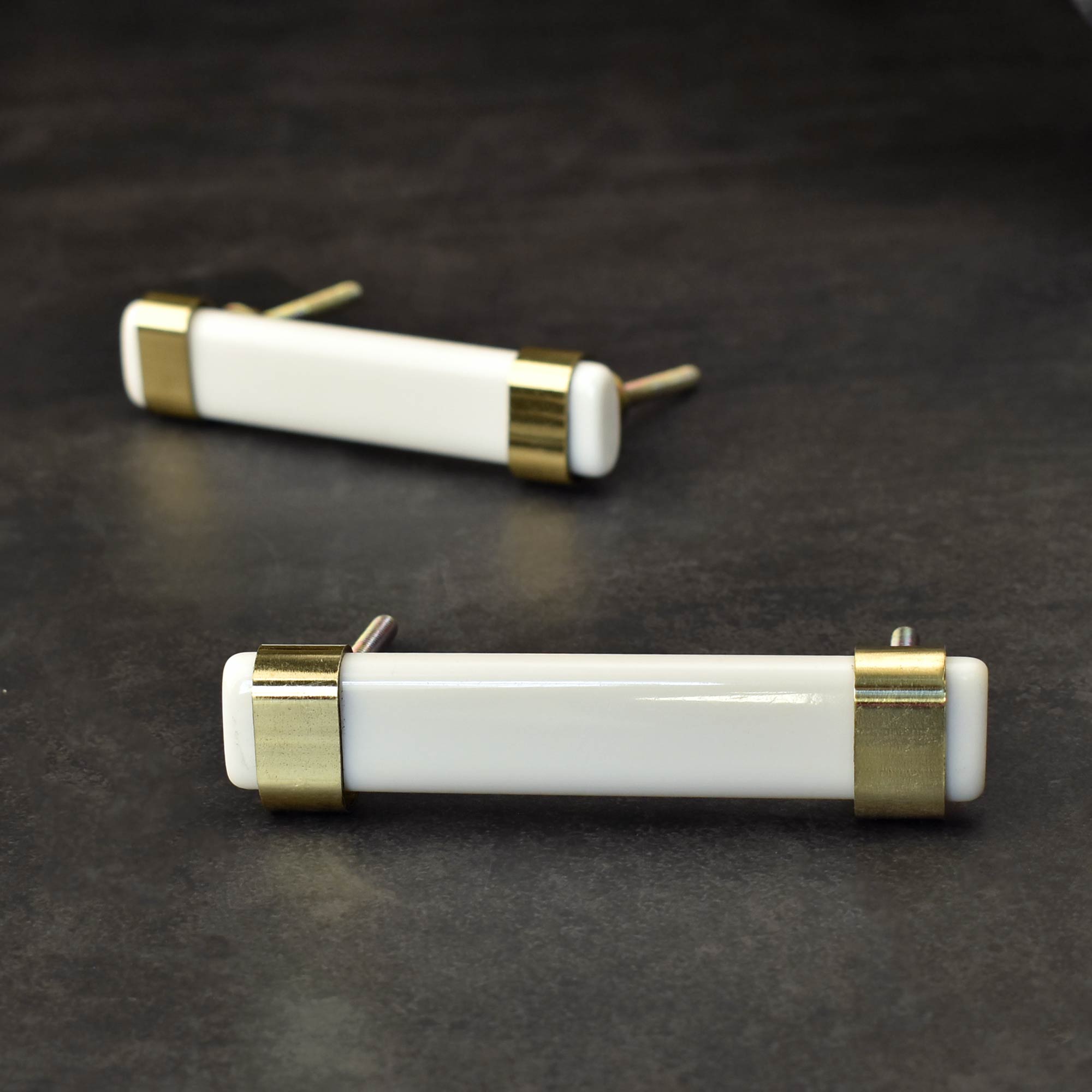 brass and white dresser drawer handle