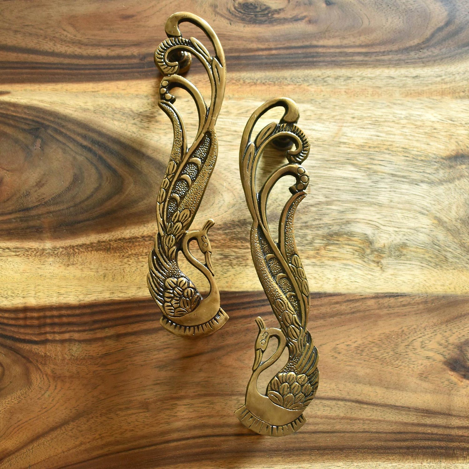 antique peacock brass door handle