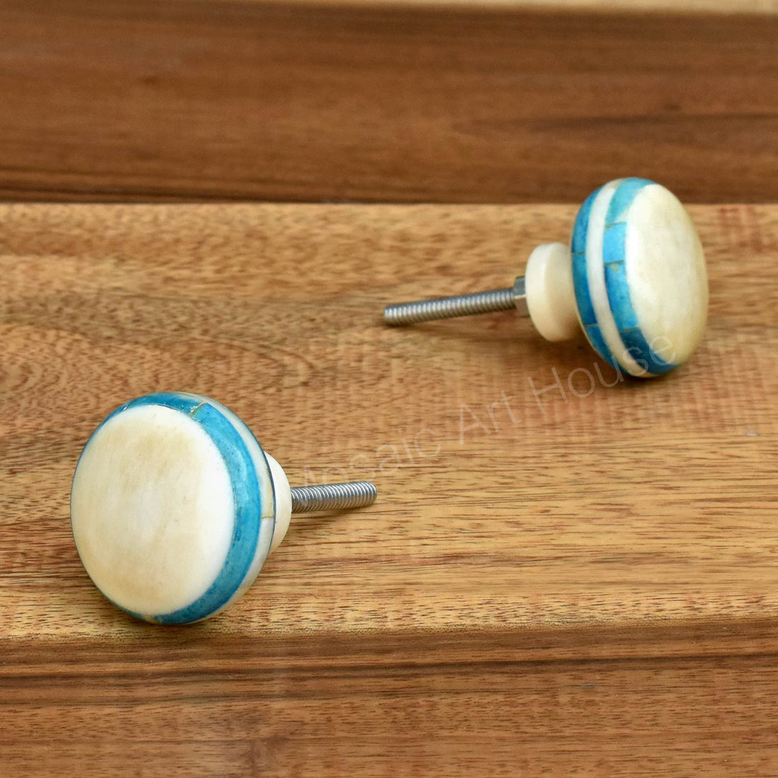 white and blue bone knob