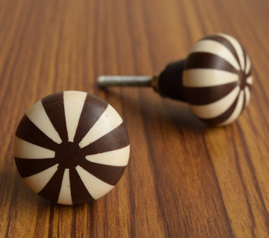 white and brown drawer knobs